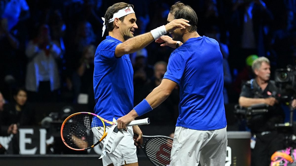 While hugging teammate Nadal, Federer overcome with emotion was seen bursting into tears. Credit: AFP Photo