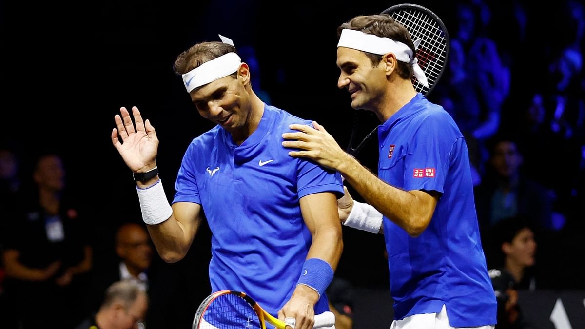 Team Europe's Roger Federer and Rafael Nadal are seen sharing a laugh during the match. Credit: Reuters Photo