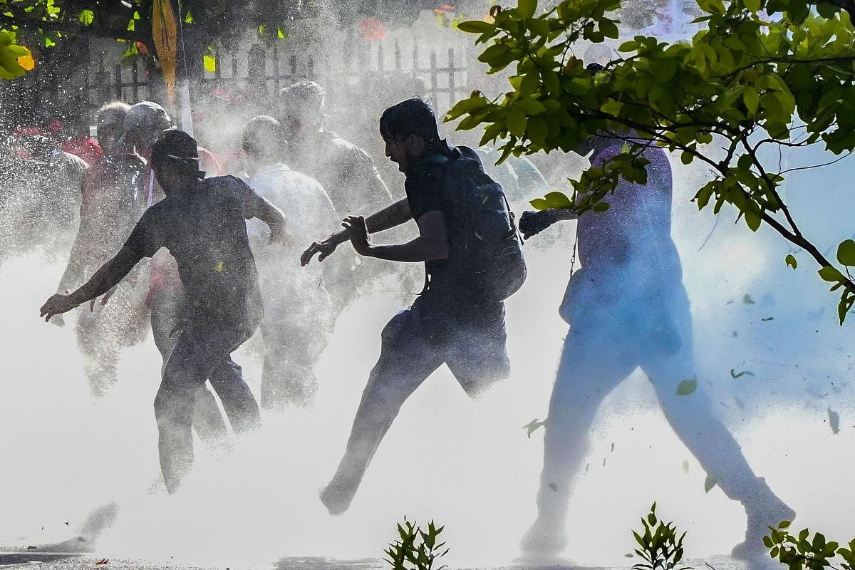 Sri Lankan police dispersed hundreds of demonstrators, a day after severely curtailing protest rights in response to months of unrest sparked by the island nation's sharp economic downturn. Credit: AFP Photo