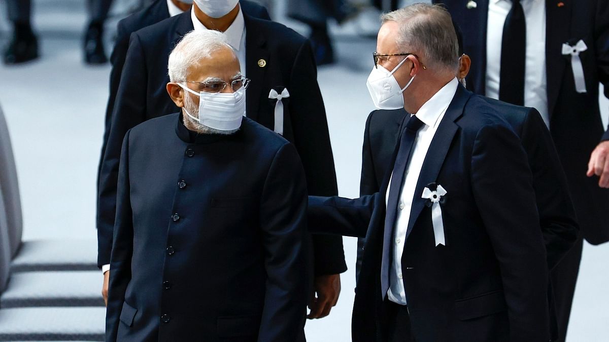 Prime Minister Narendra Modi is seen interacting with Australian Prime Minister Anthony Albanese during the state funeral of former Japanese Prime Minister Shinzo Abe at Nippon Budokan Hall in Tokyo. Credit: AP Photo