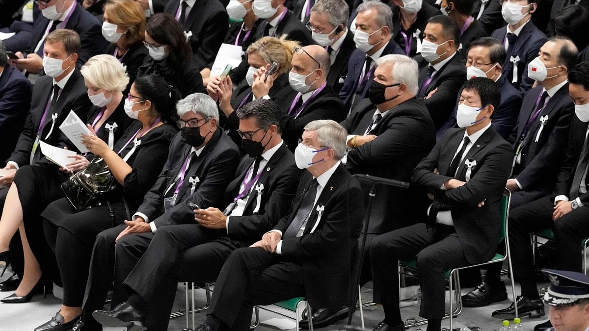 Thousands of mourners flooded the funeral venue, forcing organisers to open the hall half-an-hour early. Credit: AFP Photo