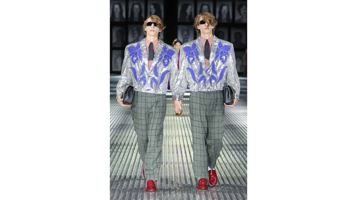 The double extravaganza at the show flooded social media with netizens widely sharing the pictures from the show that saw identically-dressed twins. Credit: Gucci/Facebook