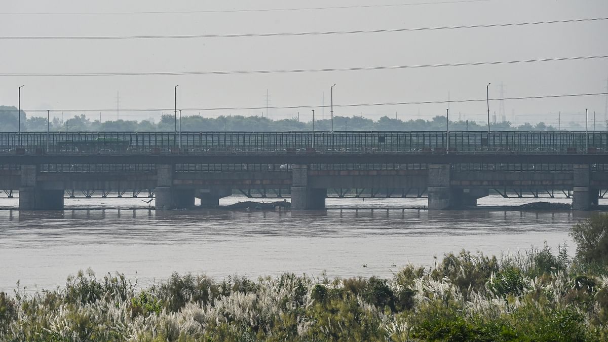 The Yamuna had breached the danger mark of 205.33 metres on August 12, following which around 7,000 people were evacuated from the low-lying areas near the riverbanks. Credit: PTI Photo