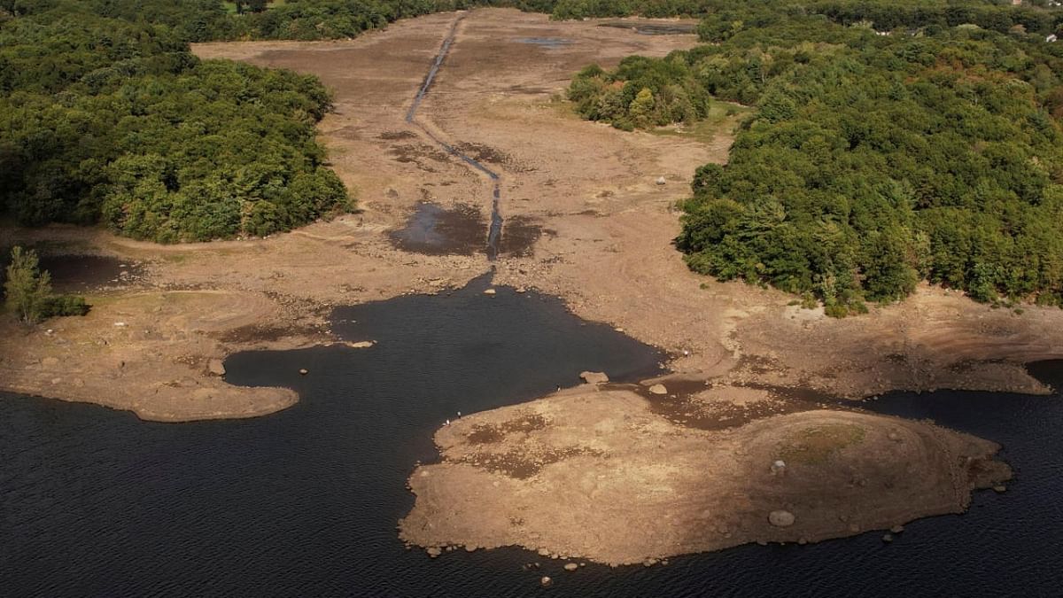 Low water levels in Breeds Pond, a public drinking supply, are seen, amid an outdoor watering ban because of continued drought conditions, in Lynn, Massachusetts. Credit: Reuters photo