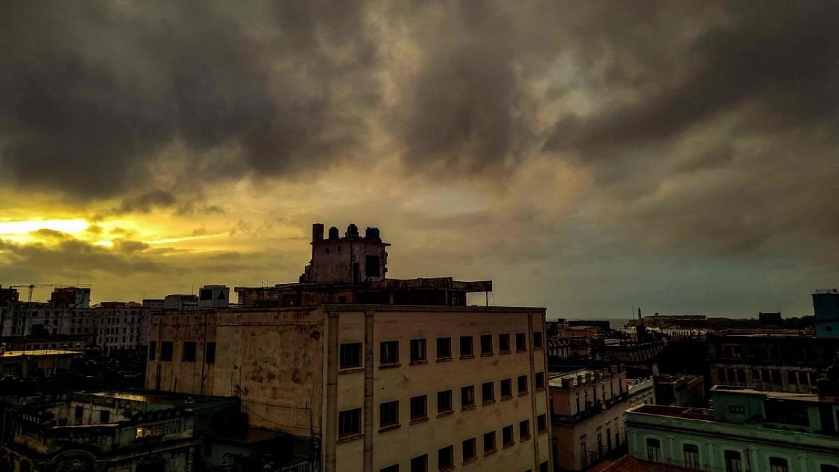 View of the sunset in Havana, on September 27, 2022 after the passage of Hurricane Ian. Credit: AFP Photo