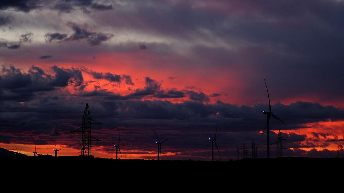 A view shows wind turbines during sunset in Alagon, near Zaragoza, Spain. Credit: Reuters photo