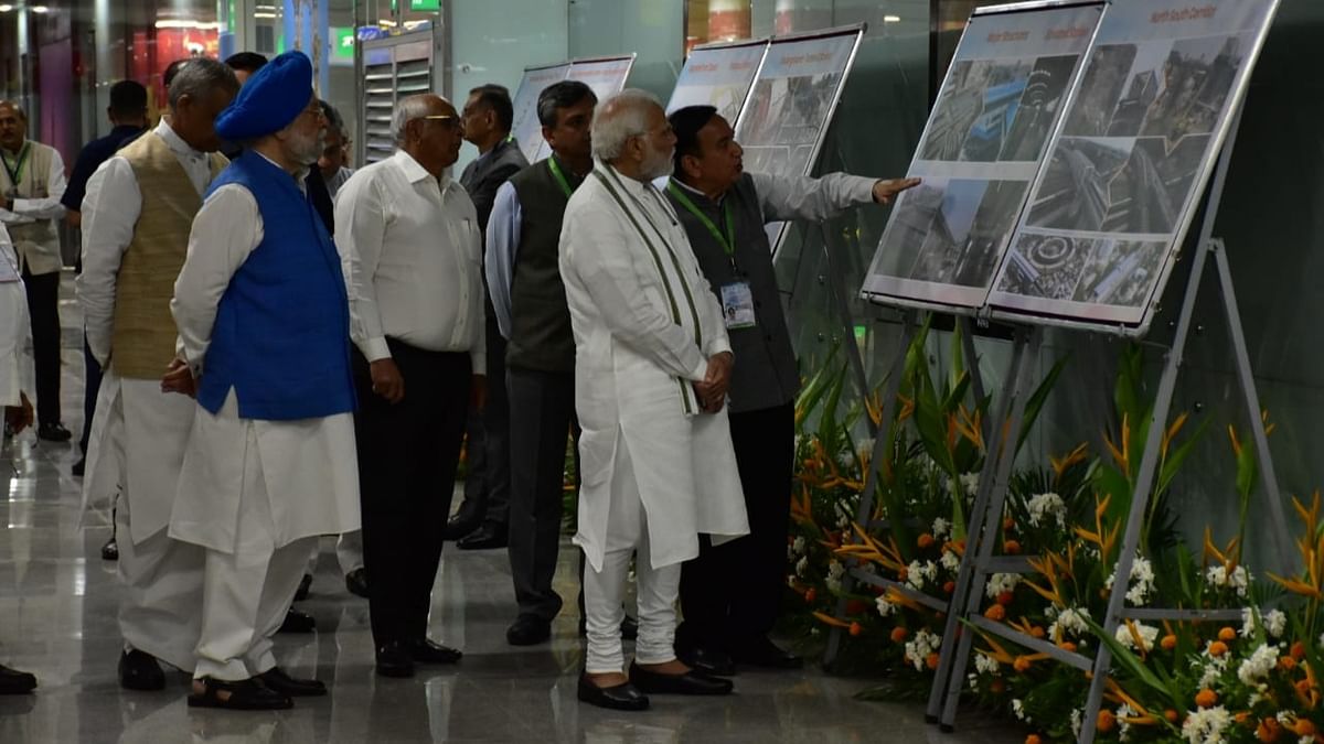 Gujarat Chief Minister Bhupendra Patel and party MPs C R Paatil and Kirit Solanki accompanied him during the journey. Credit: Twitter/Bhupendrapbjp