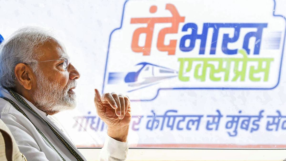 PM Narendra Modi rides the Gandhinagar-Mumbai Vande Bharat Express train after flagging it off, in Gandhinagar. Credit: PTI Photo