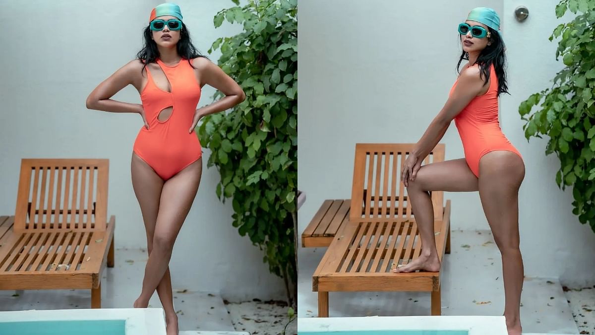 In one of the photos, the actress can be seen wearing a tangerine monokini. Credit: Instagram/amalapaul