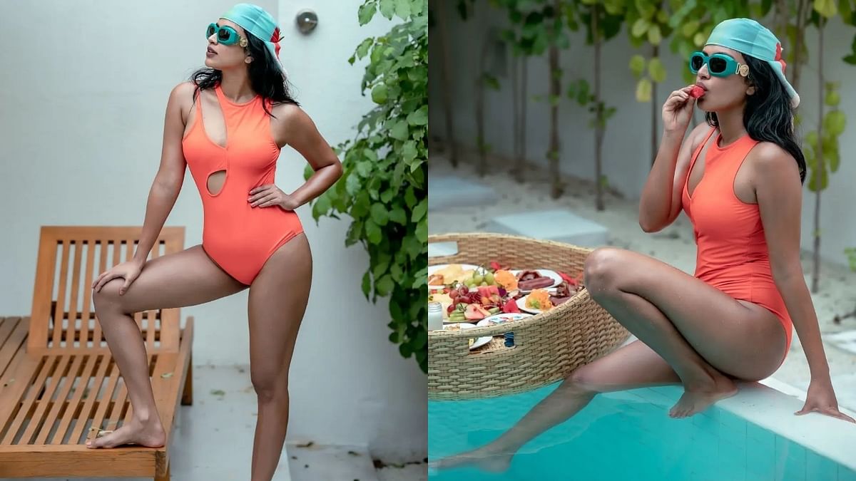 Amala Paul wears a tangerine bikini as she chills by the pool. Credit: Instagram/amalapaul