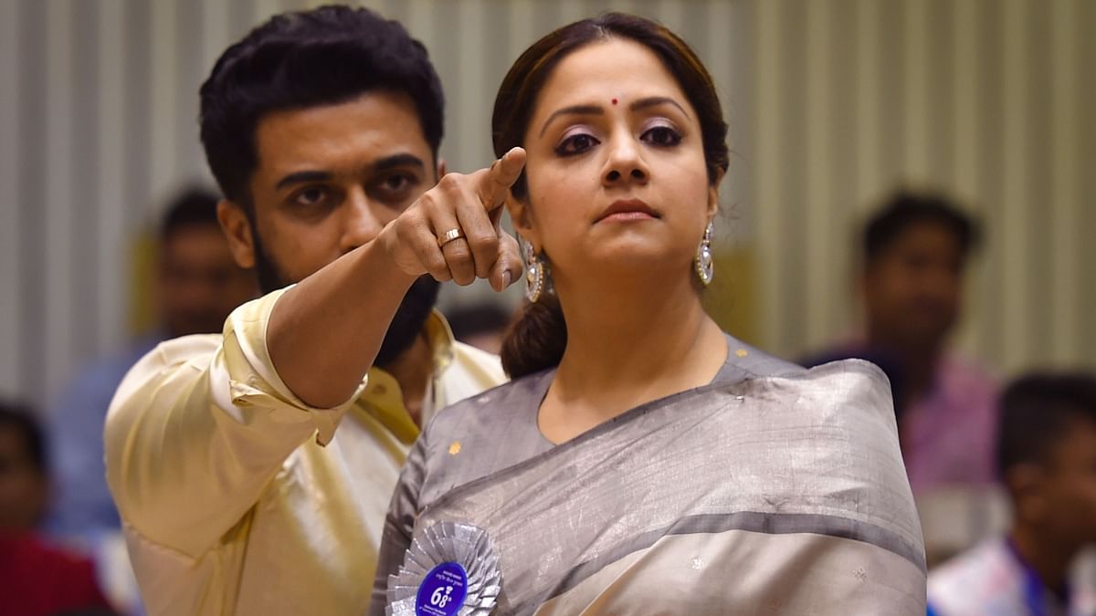 Actor Suriya with his wife Jyothika during the 68th National Film Awards presentation ceremony. Credit: PTI Photo