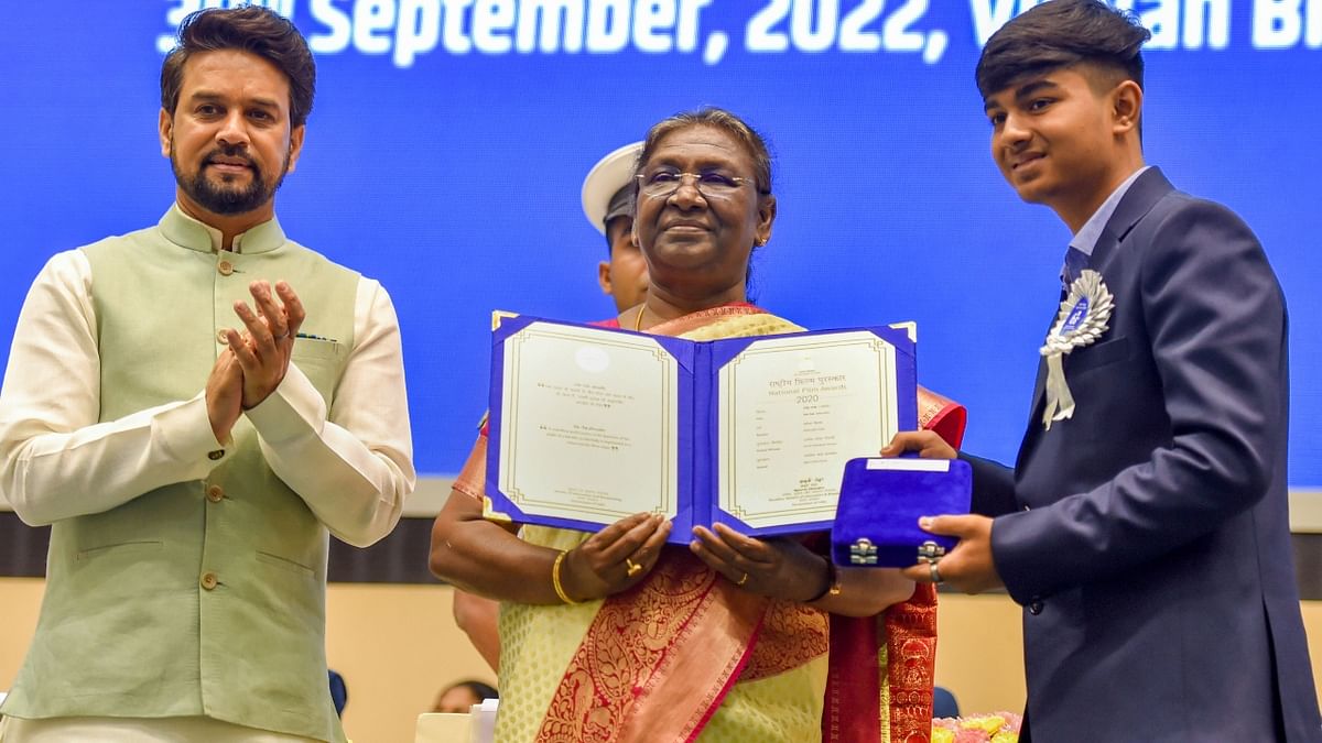 The President presents Best Child Artist Award to Anish Mangesh Gosavi. Credit: PTI Photo