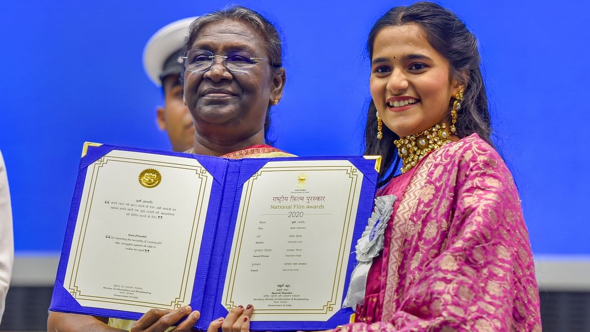 President Droupadi Murmu presents Best Child Artist Award to Akanksh Laxman Pingale during the 68th National Film Awards presentation ceremony, at Vigyan Bhawan in New Delhi. Credit: PTI Photo