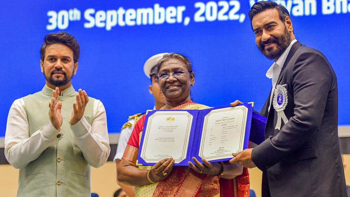 President Droupadi Murmu presents Best Actor Award to Bollywood actor Ajay Devgn during the 68th National Film Awards presentation ceremony, at Vigyan Bhawan in New Delhi. Credit: PTI Photo