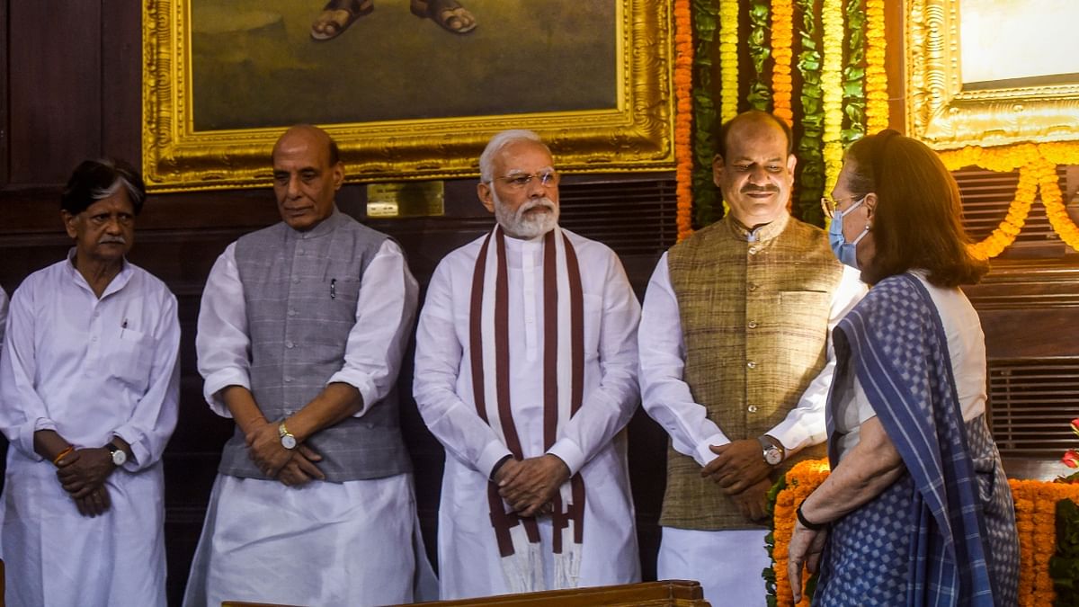 Defence Minister Rajnath Singh, PM Narendra Modi and Lok Sabha Speaker Om Birla look on as Congress interim President Sonia Gandhi leaves after paying tributes to Mahatma Gandhi in New Delhi. Credit: PTI Photo