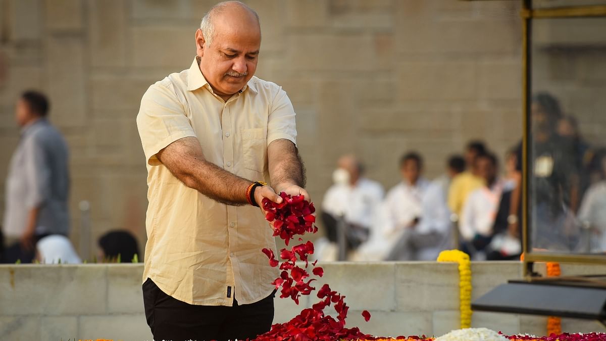 Delhi Deputy Chief Minister Manish Sisodia pays homage to Mahatma Gandhi at Rajghat in New Delhi.