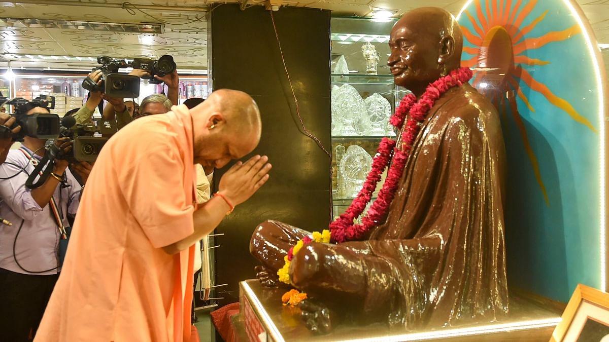 UP CM Yogi Adityanath offers tributes to Mahatma Gandhi at Gandhi Ashram, in Lucknow. Credit: PTI Photo