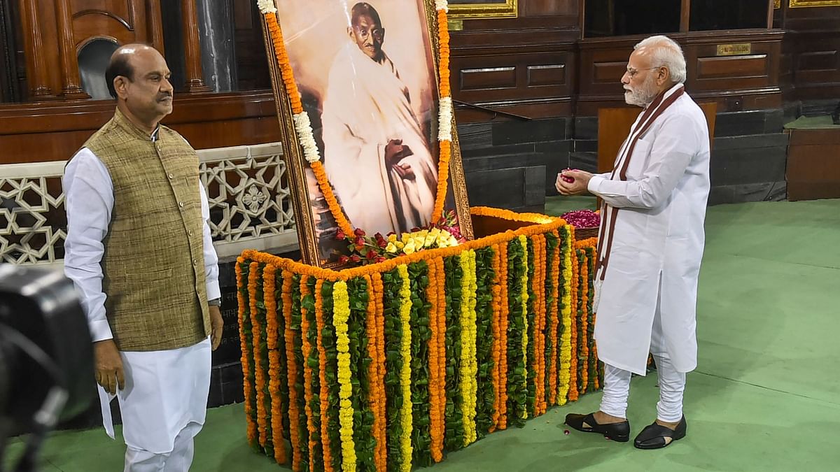 PM Narendra Modi pays tribute to Mahatma Gandhi in the Central Hall of Parliament, New Delhi. Credit: PTI Photo