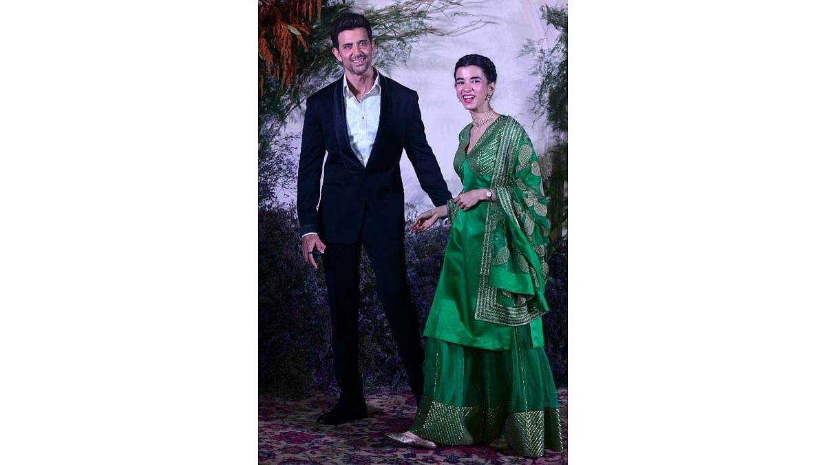 Hrithik Roshan attended the reception with his apparent lady love Saba Azad. Credit: AFP Photo