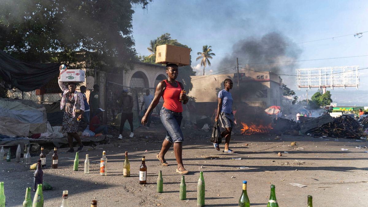 Demonstrators fill the streets during a protest to demand the resignation of Prime Minister Ariel Henry, in the Petion-Ville area of Port-au-Prince, Haiti, October 3, 2022. Credit: AFP Photo