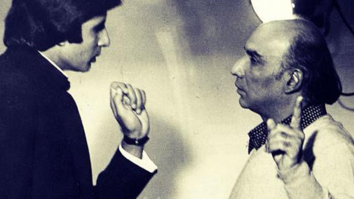 Bachchan with the legendary Yash Chopra on the sets of a movie. It was Chopra who came to the Big B's assistance when the actor was going through financial problems. Credit: Twitter/SrBachchan