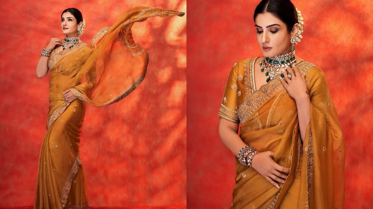 Raveena Tandon wore a mustard organza saree which she paired with a chanderi blouse detailed with light gold and aari work on it. Credit: Instagram/officialraveenatandon