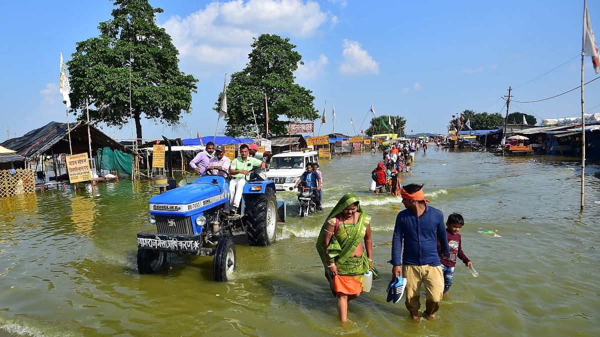 CM Yogi has directed ministers to immediately visit the districts under their supervision and extend cooperation in relief and rescue work. Credit: AFP Photo