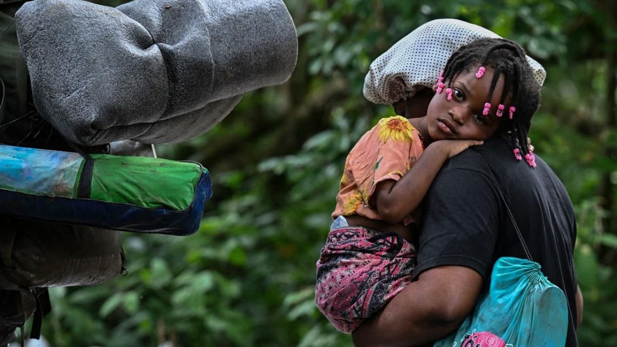 Venezuelan migrants arrive at Canaan Membrillo village, the first border control of the Darien Province in Panama, on October 13, 2022. Credit: AFP Photo