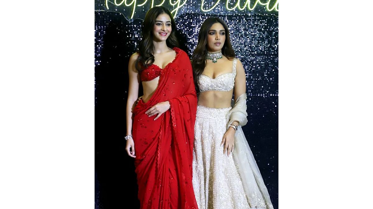 Ananya Pandey and Bhumi Pednekar pose for a picture at Krishan Kumar’s Diwali bash. Credit: PTI Photo