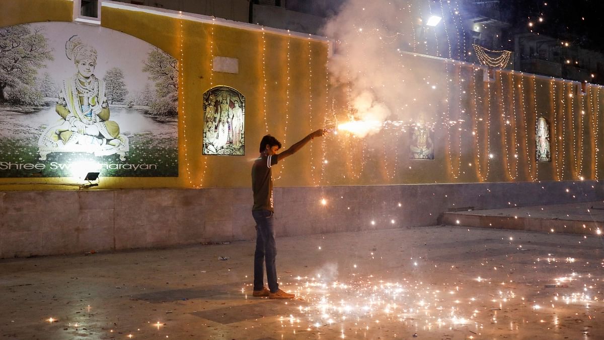 The festival of lights was also celebrated across Tamil Nadu and Puducherry. In lines with a Supreme Court order, the Tamil Nadu government had specified that crackers should be burst only from 6 am to 7 am and 7 pm to 8 pm. Credit: Reuters Photo
