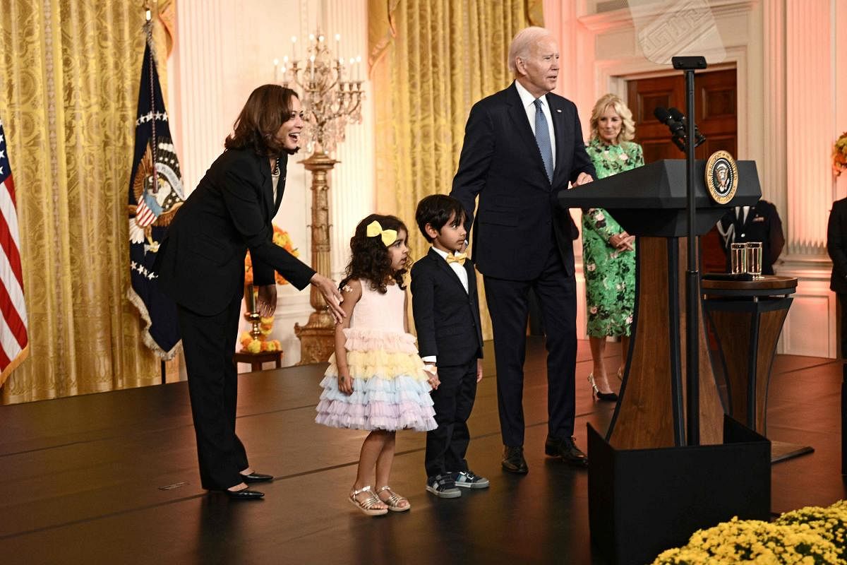 US Vice President Kamala Harris (L), US President Joe Biden (C) and US First Lady Jill Biden (L) host a reception to celebrate Diwali in the East Room of the White House in Washington, DC. Credit: AFP Photo