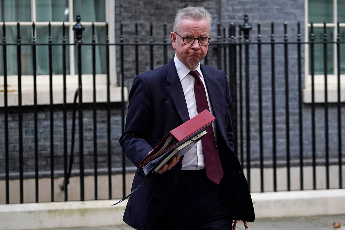 Britain's Secretary of State for Levelling Up, Housing and Communities and Minister for Intergovernmental Relations Michael Gove leaves after attending the first cabinet meeting under the new Prime Minister, Rishi Sunak. Credit: AFP Photo