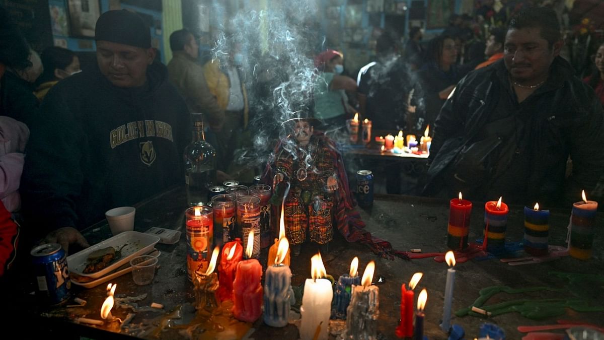 An image of San Simon is seen at the Temple of San Simon in the municipality of San Andres Itzapa, Chimaltenango, Guatemala, on October 28, 2022, during a pagan festival to honour to the saint. Credit: AFP Photo