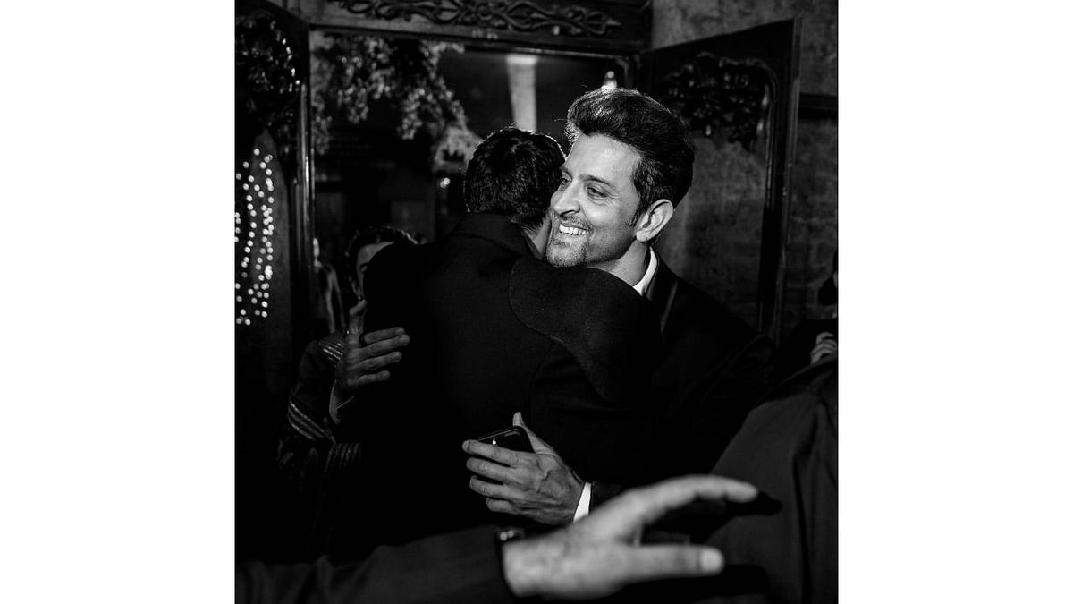 Ali Fazal shares a warm hug with Hrithik Roshan at the reception. Credit: Special Arrangement