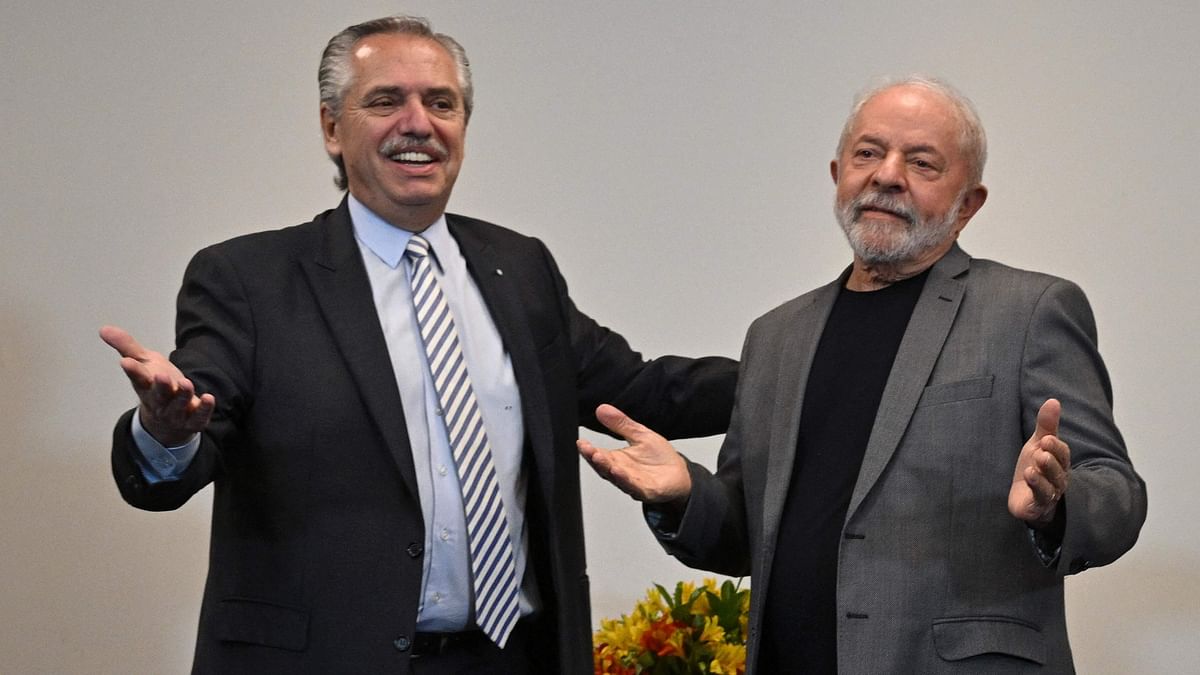 Argentina's President Alberto Fernandez (L) and Brazil's President-elect Luiz Inacio Lula da Silva pose for pictures during a meeting in Sao Paulo, Brazil. Credit: AFP Photo