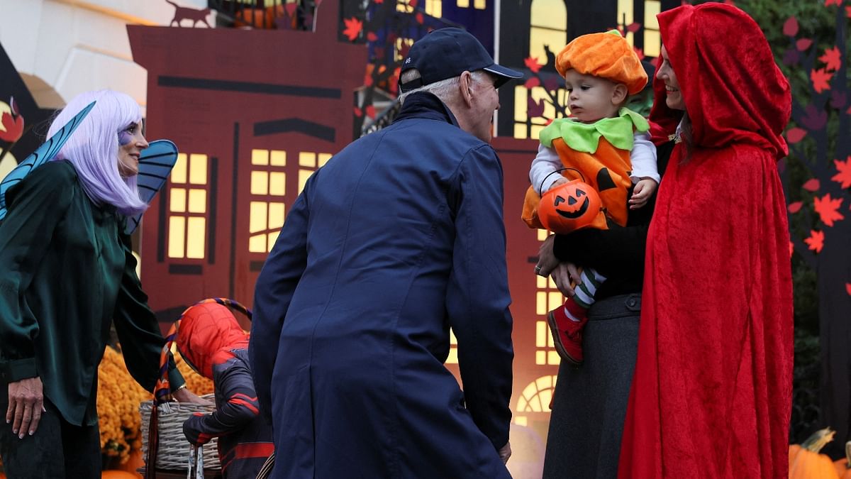 US President Joe Biden and first lady Jill Biden distributed Halloween candy to visiting children at the South Portico of the White House in Washington, US. Credit: Reuters Photo