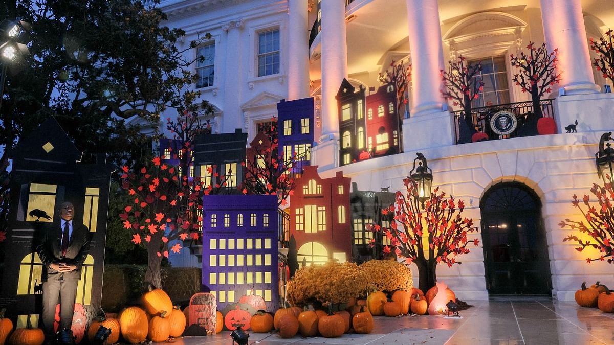 President Joe Biden and first lady Jill Biden welcomed trick-or-treaters to the White House to celebrate Halloween, their first time hosting such a celebration since taking office. Credit: Reuters Photo