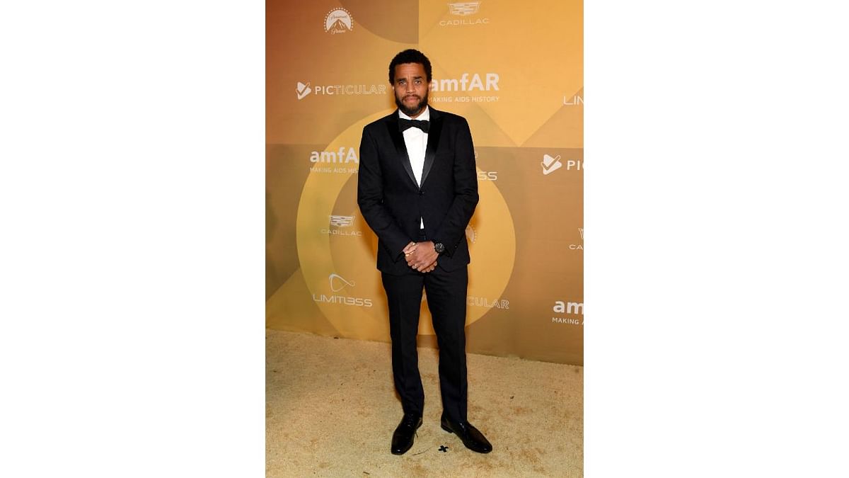 Michael Ealy put on a stylish black two-piece suit accompanied by a white shirt. Credit: AFP Photo