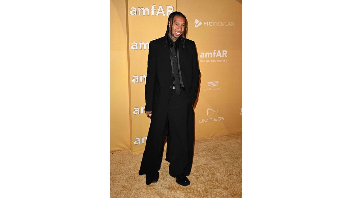 US rapper Tyga arrives for the amfAR Gala Los Angeles. Credit: AFP Photo