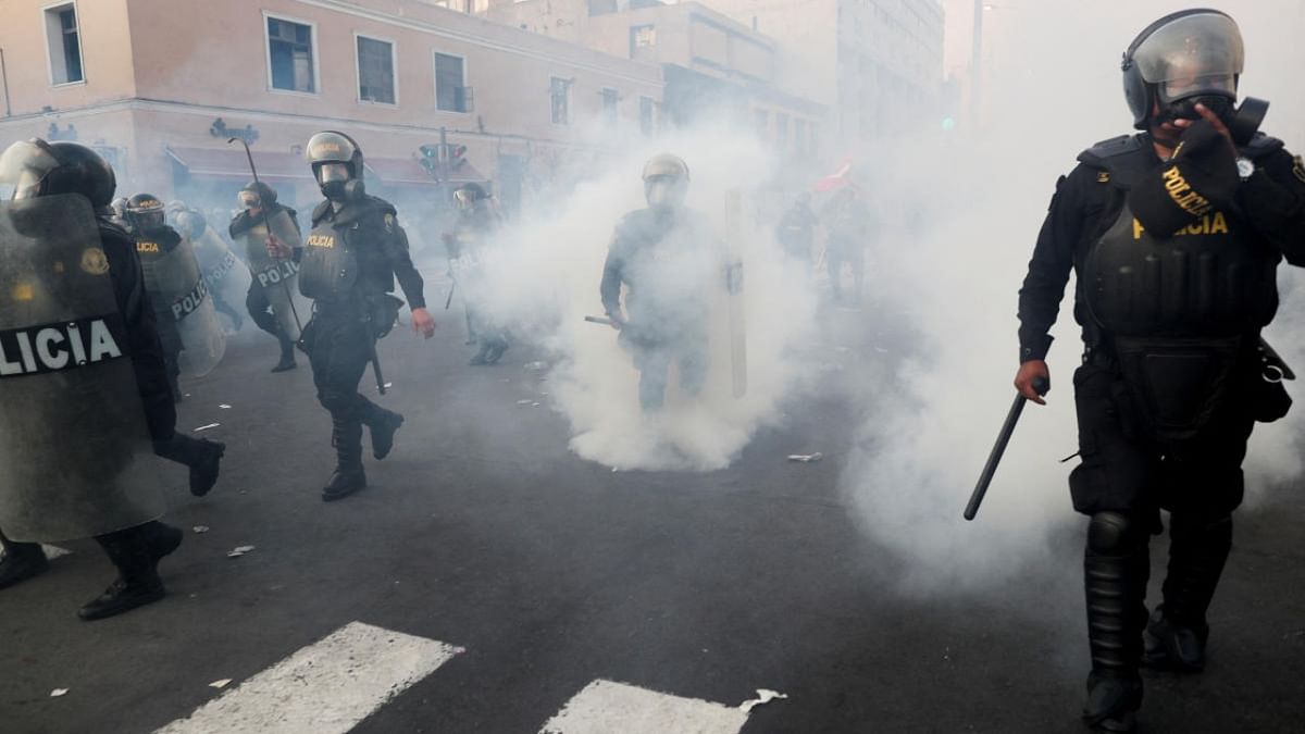 Police officers clash with demonstrators during a protest against the government of Peru's President Pedro Castillo, in Lima, Peru. Credit: Reuters photo