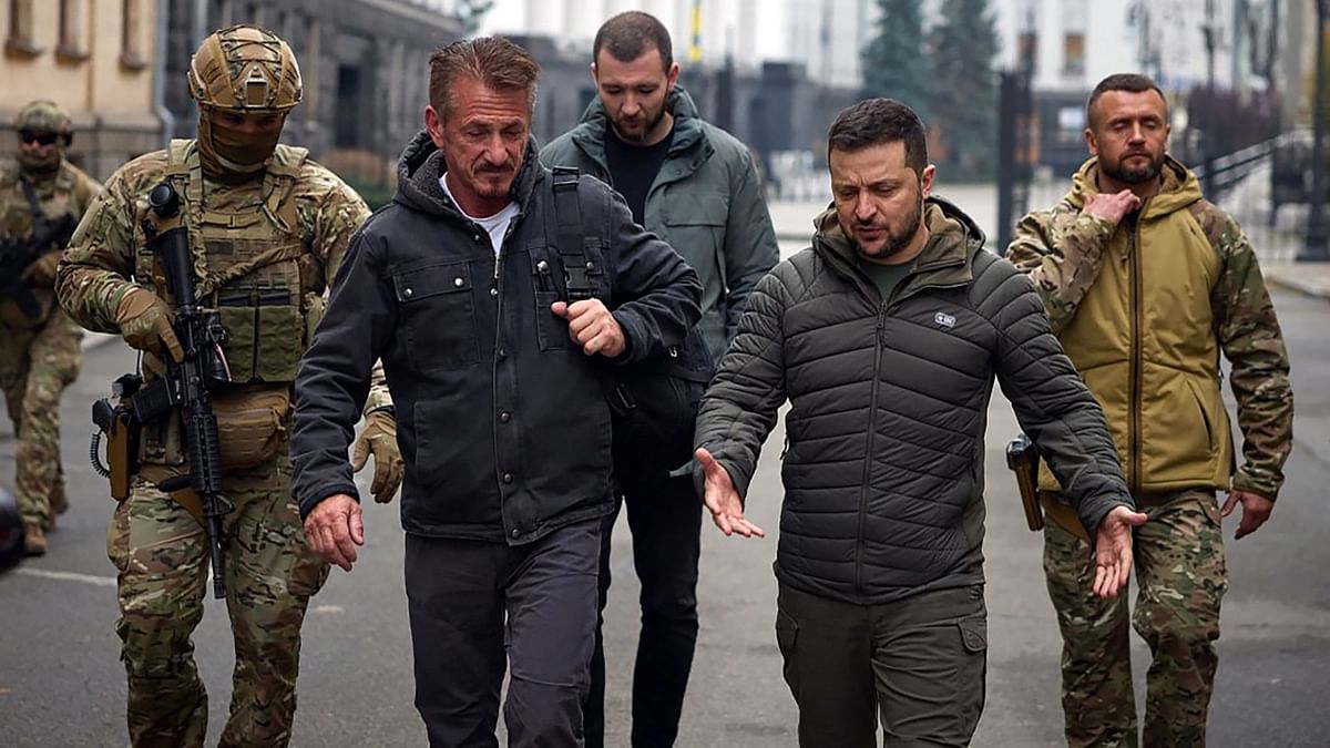 US actor Sean Penn and Ukrainian President Volodymyr Zelenskyy are seen talking as the former leaves after meeting the President in Kyiv. Credit: AFP Photo
