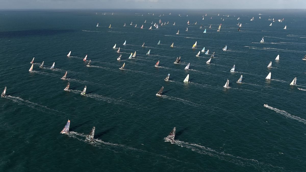 Skippers take the start of the Route du Rhum solo sailing race, off the coast of Saint-Malo, western France, on November 9, 2022. Credit: AFP Photo