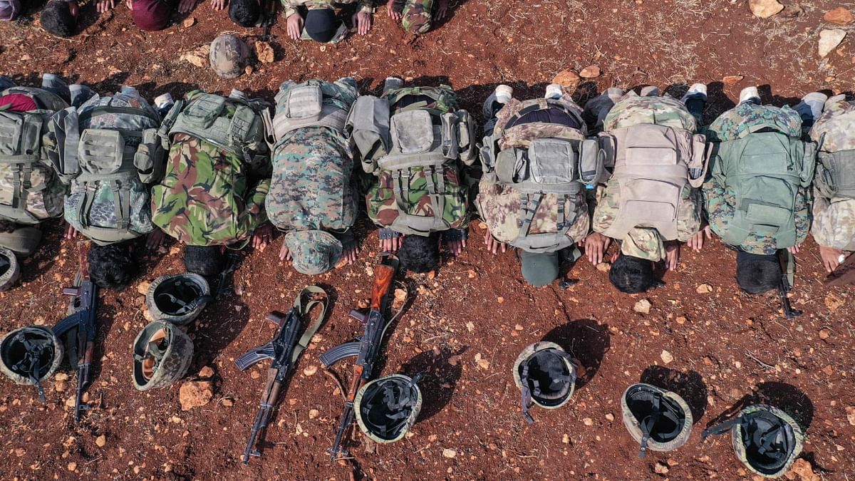 This aerial view shows fighters affiliated with Syria's