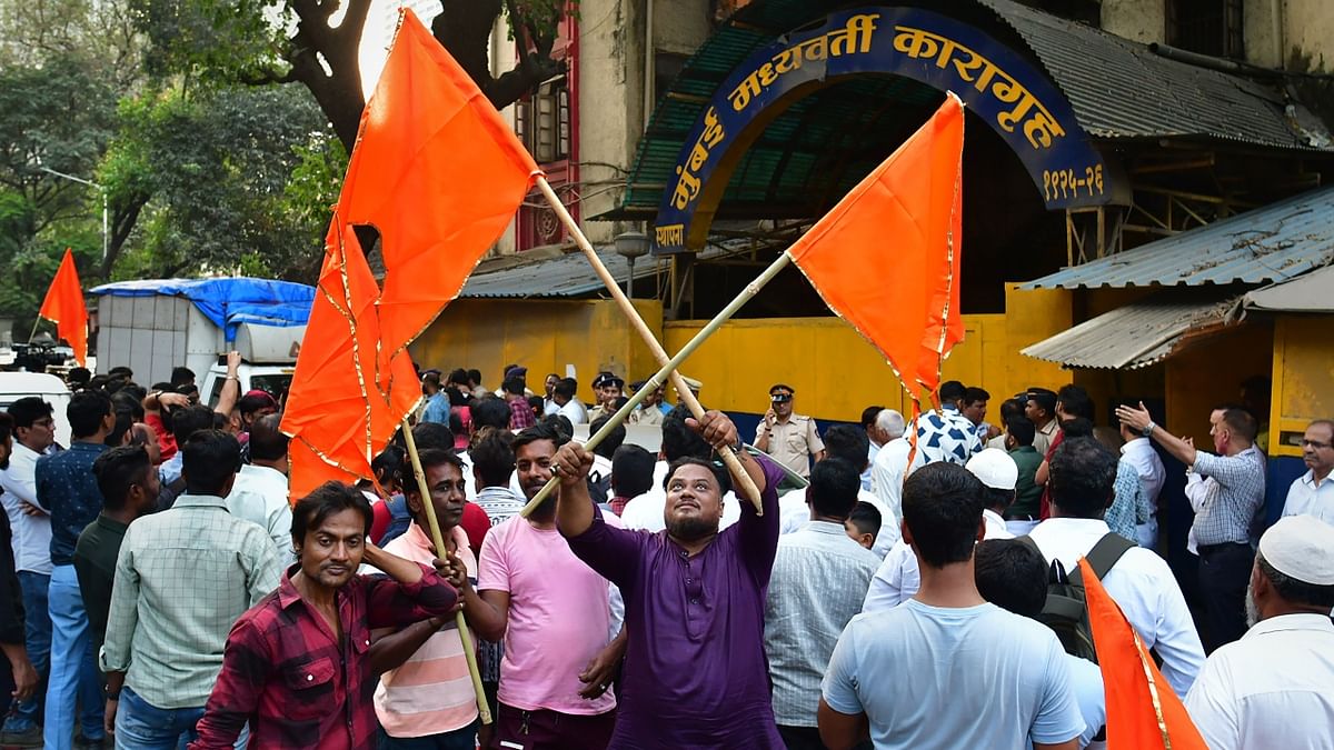 Supporters and well-wishers of Shiv Sena (Uddhav Balasaheb Thackeray) leader Sanjay Raut celebrated his release outside the Arthur Road Jail in Mumbai. Credit: PTI Photo