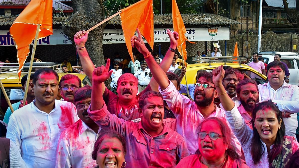 Supporters of Shiv Sena (Uddhav Balasaheb Thackeray) leader Sanjay Raut celebrate his release in Mumbai. Credit: PTI Photo