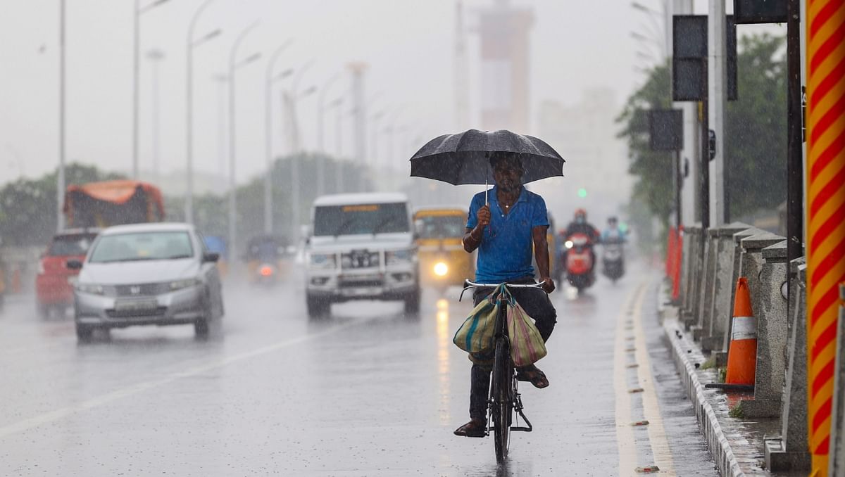 Widespread moderate-to-heavy rains lashed several parts of Tamil Nadu on Friday, disrupting normal life. Credit: PTI Photo
