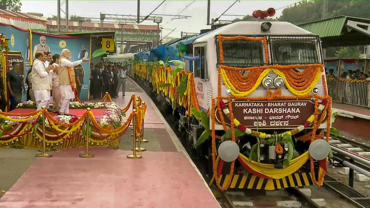 The PM later flagged off south India's first, state-of-the-art Vande Bharat express, besides Bharat Gaurav Kashi Darshan service, operated by the Karnataka government's Muzrai Department, from the Krantiveera Sangolli Railway station. Credit: Twitter/Narendra Modi