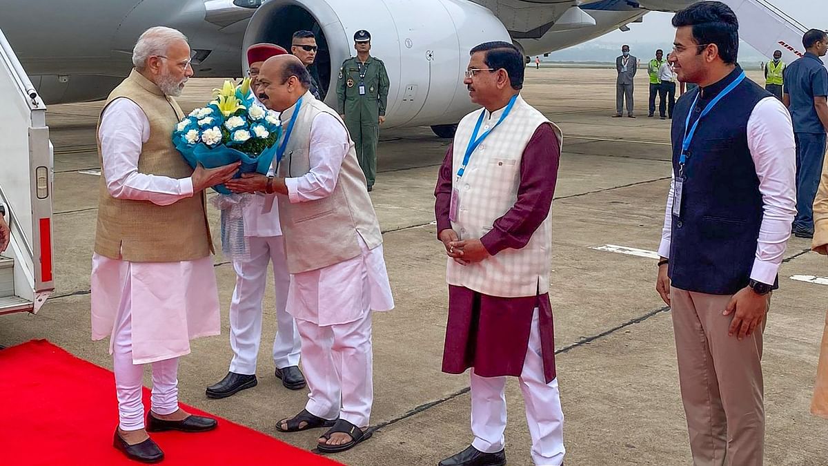 On November 11, PM Narendra Modi arrived in Bengaluru city to take part in various events. On arrival at HAL Airport, Modi was received by Karnataka Governor Thaawarchand Gehlot, Chief Minister Basavaraj Bommai and several of his cabinet colleagues and officials. Credit: Twitter/@CMofKarnataka