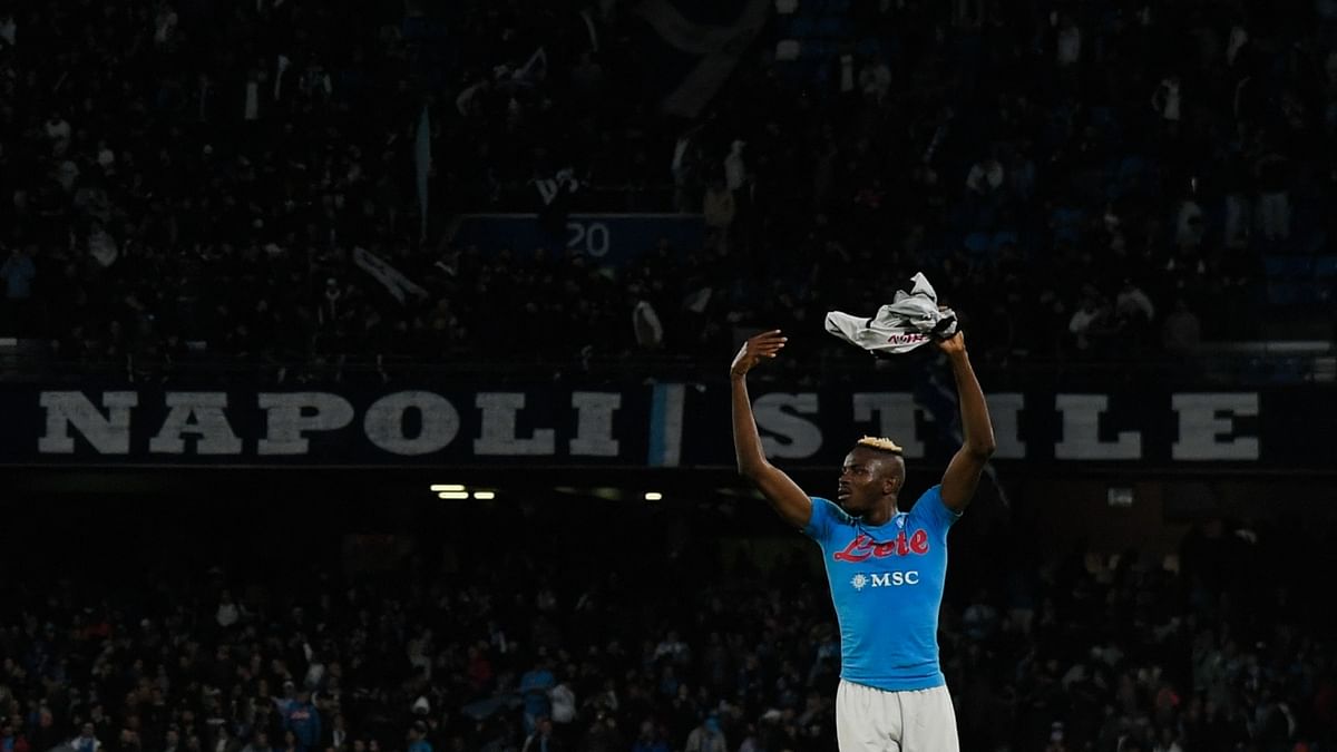 Napoli's Nigerian forward Victor Osimhen celebrates at the end of the Italian Serie A football match between Napoli and Udinese on November 12, 2022 at the Diego-Maradona stadium in Naples. Credit: AFP Photo