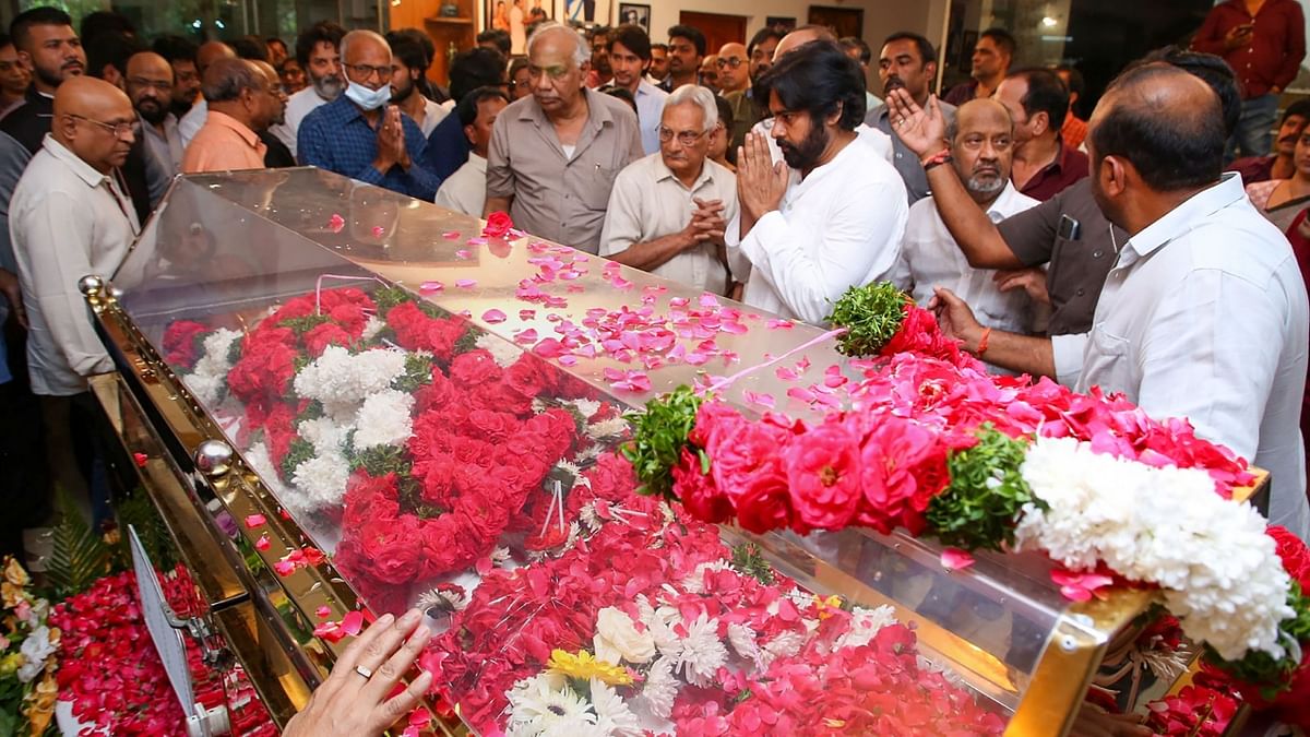 Telugu actor Pawan Kalyan pays his tribute to the mortal remains of actor Krishna in Hyderabad. Credit: PTI Photo
